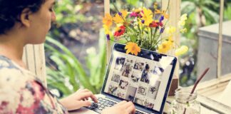 Woman is using computer laptop