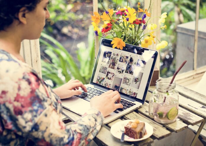 Woman is using computer laptop