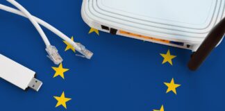 European union flag depicted on table with internet rj45 cable