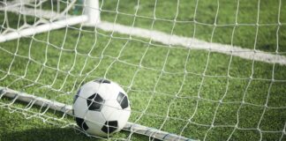 Soccer ball in gate