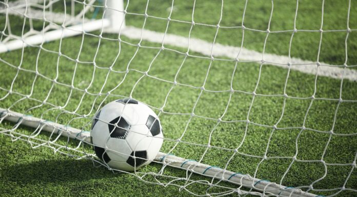 Soccer ball in gate